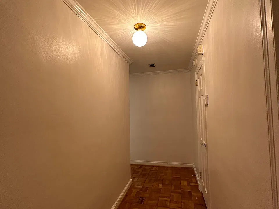 entrance with spacious hall closet and refreshed with Italian lighting