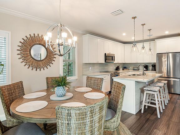 Dining area, kitchen, and bar