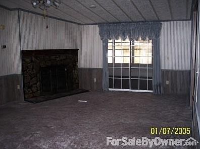 Greatroom with fireplace
						:
						25' X 15' 4"