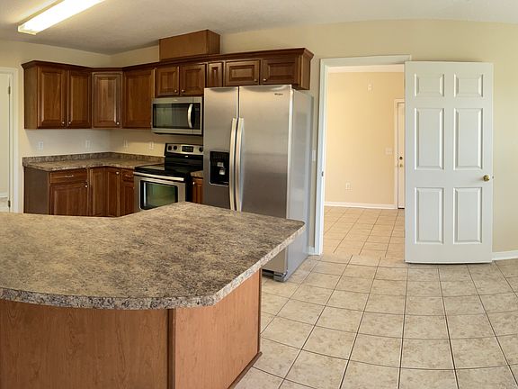 Dining Room and Kitchen and door into Office