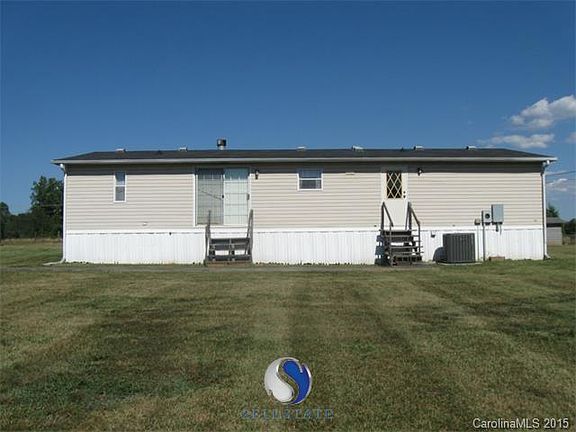 Exterior back featuring 2 entrances