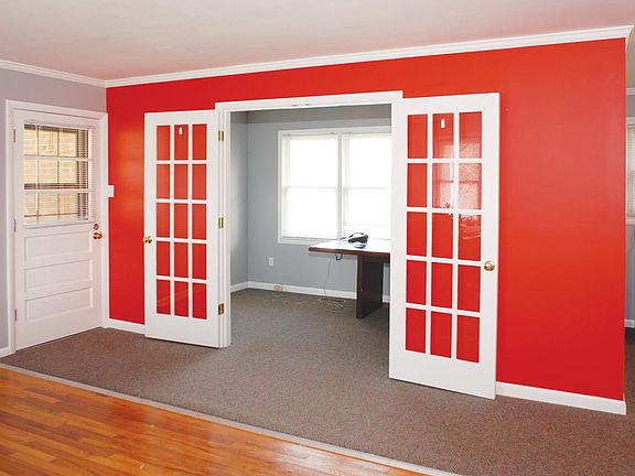 Conference room with french doors. Colors have been changed since these pictures (updated!) Copy/work area to right of conf room.