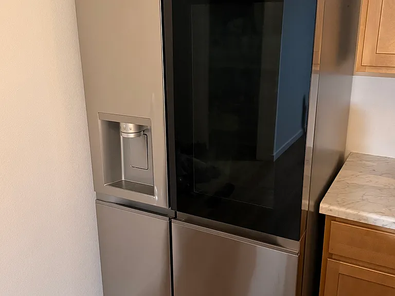 Fridge included (transparent door lights up when you knock)