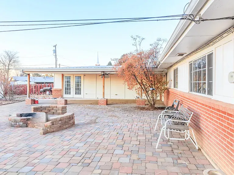 Huge backyard, landscaped for relaxation and entertaining. Enjoy evenings around the built-in fire pit, gather with friends in the multiple seating areas, or grow your favorite flowers and vegetables in the two dedicated gardening spaces.