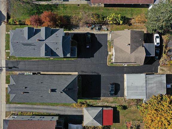 Newly paved private, rear parking lot/driveway (May 2020)
