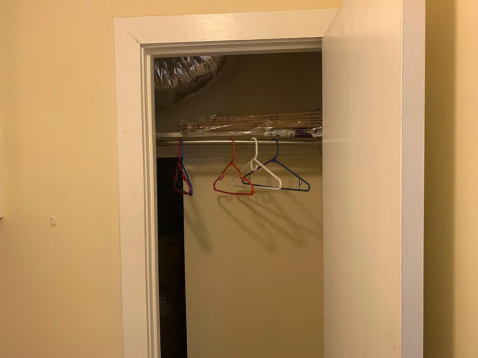 Coat Closet - access to storage space