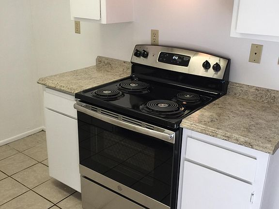 Brand New Stainless Steel GE Stove and Vent.