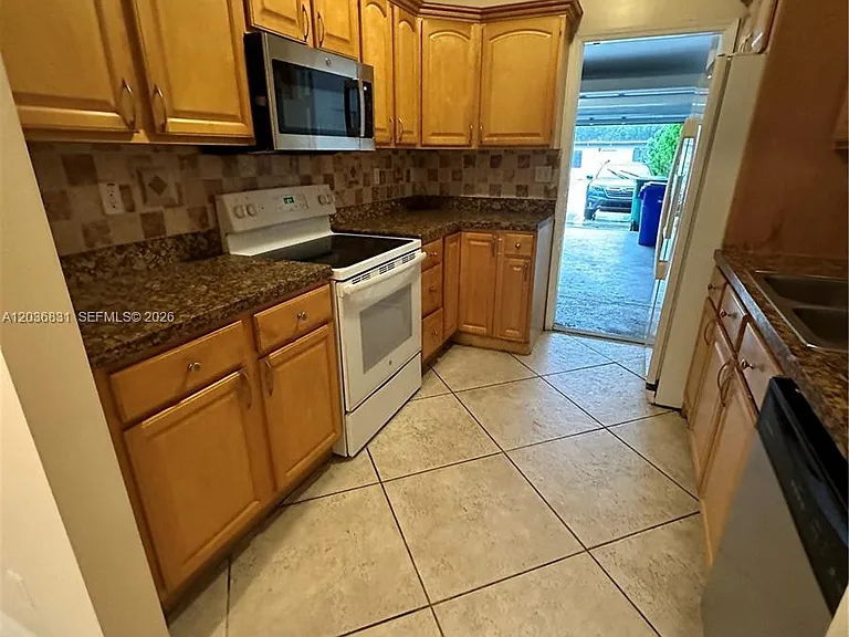 2988 NW 7th Ct — Photo 4