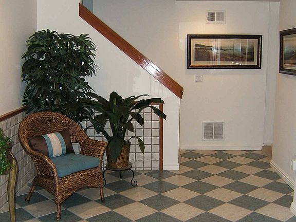 Formal entry with tile floor