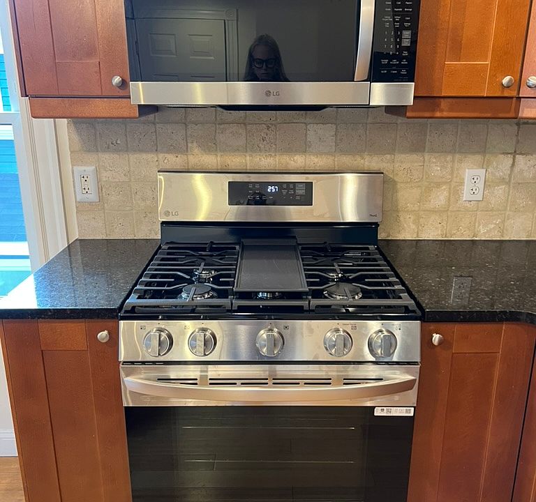 Brand new LG microwave and stove.
