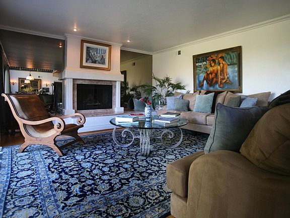 Huge Living Room with Fireplace and Large Deck.