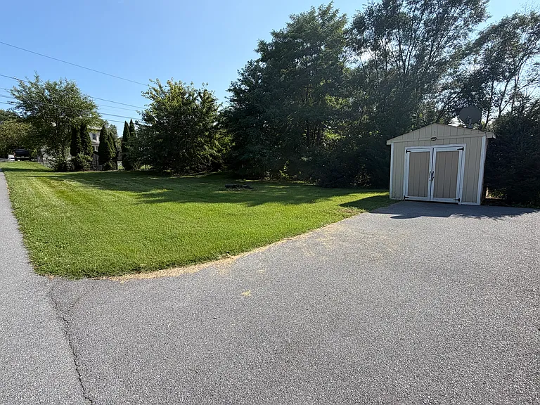 Plenty of off street parking and a sizeable storage shed as well. Also shown is the lovely yard