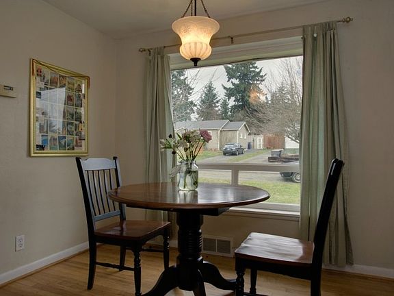 Dining area off of kitchen. Beautiful picture window for natural light!
