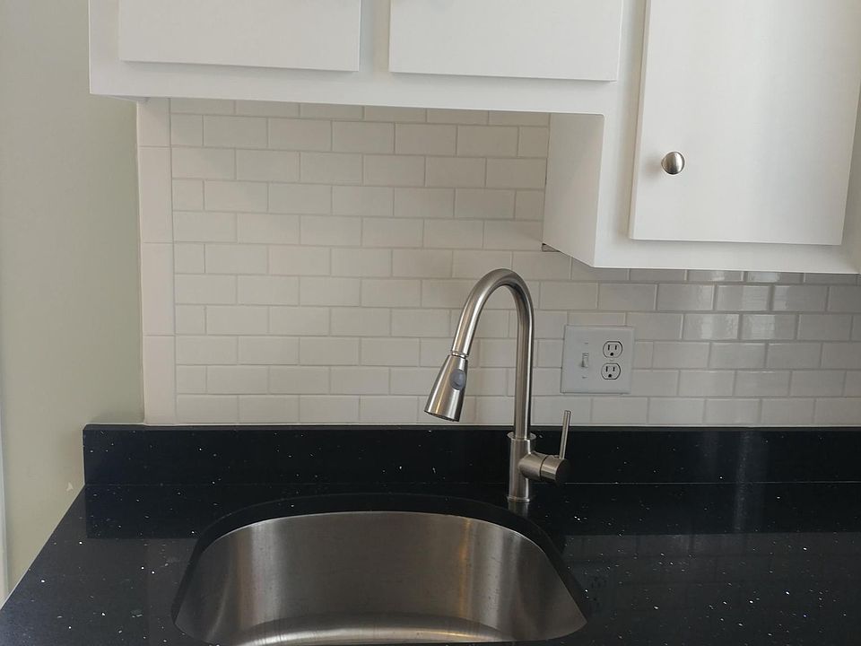 New granite counter, sink and faucet