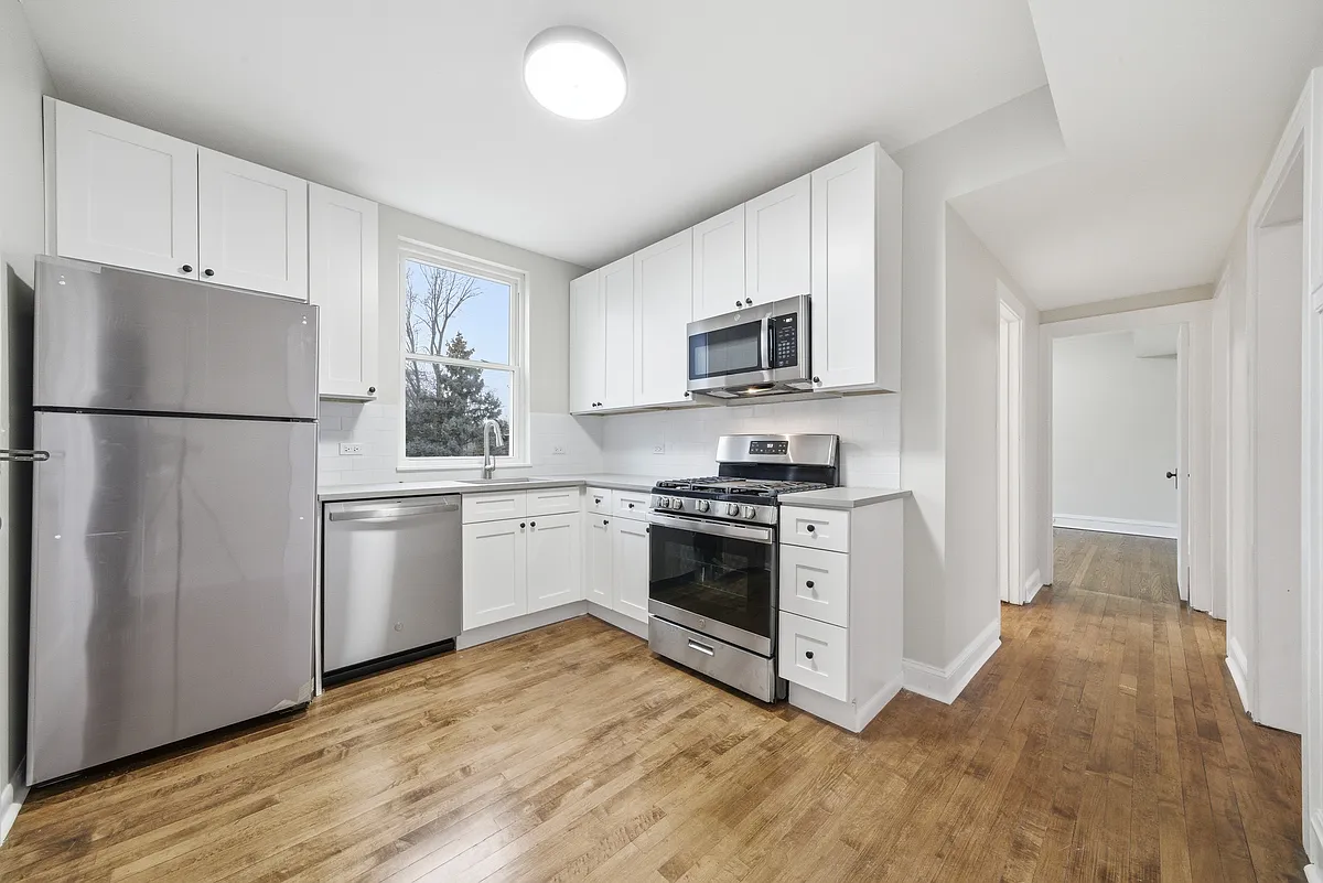Building Photo - 6936-38 N Campbell Ave #2