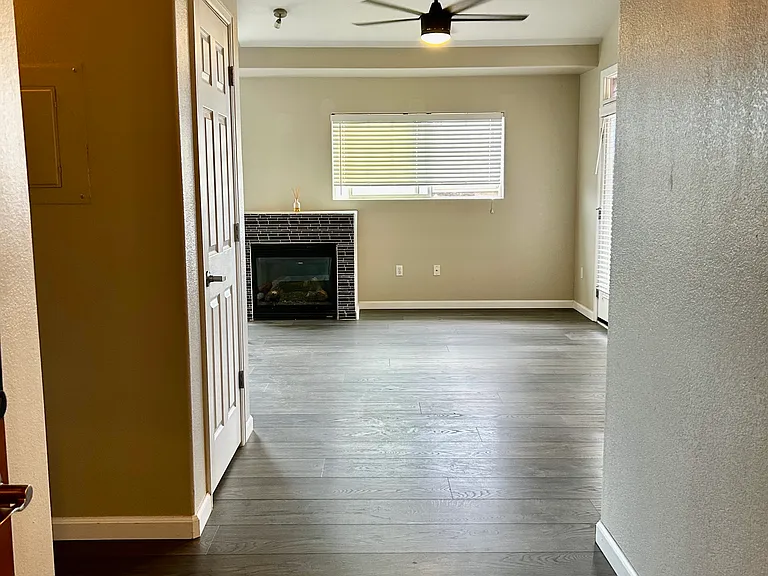 View of living room from the front door entrance.