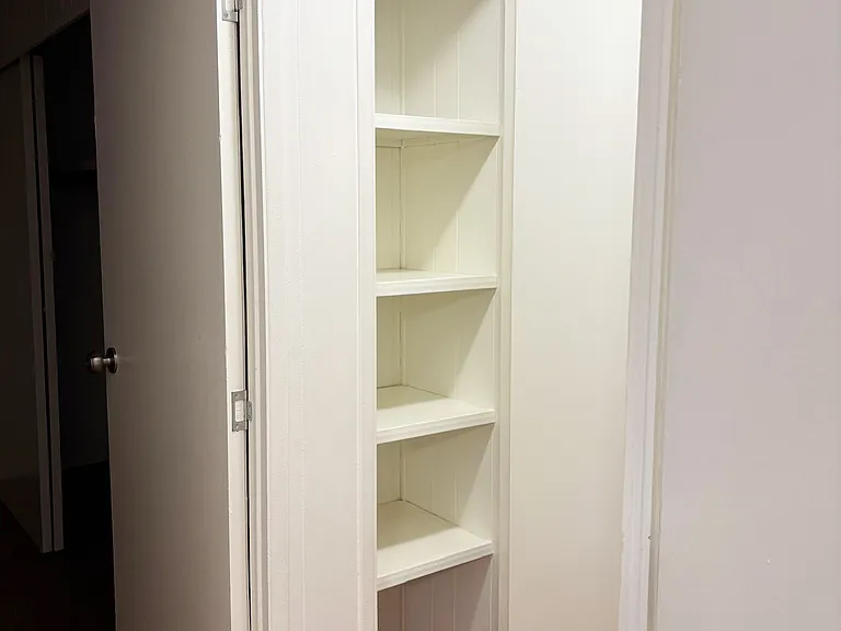 Linen closet outside of second bathroom.