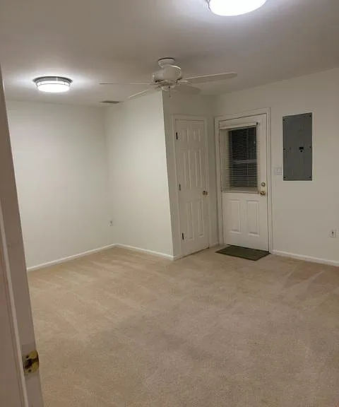 Basement with laundry and ground level exit to patio