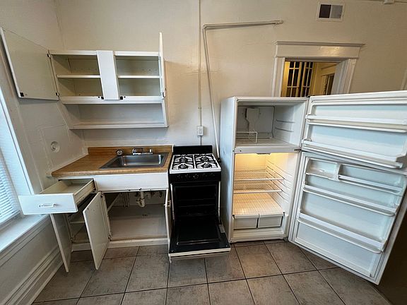 5th image of 3179-91A S Grand Blvd #203