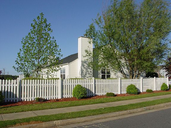 Lushly Landscaped Large Corner Lot