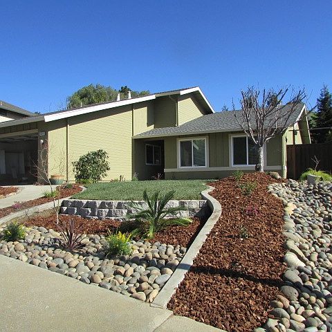 Front of home new landscaping