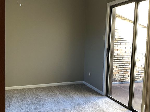3rd bedroom or office with walkout patio.