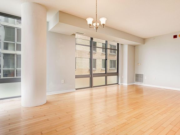 Open kitchen, living and dining areas. Tons of sunlight and fantastic views.