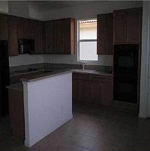 3rd image of 1903 SW Jamesport Dr