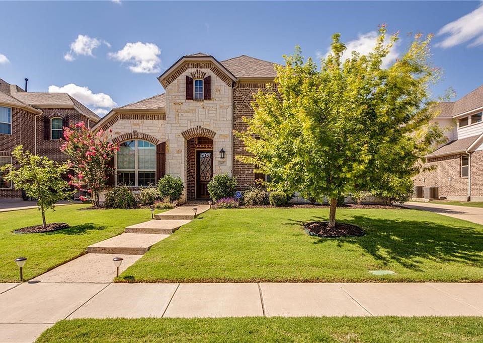 Welcome Home to 967 Abbott Lane! Stunning brick & stone elevation with cedar shutters!