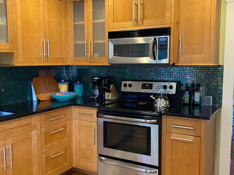 Kitchen with high quality wood cabinets that provide ample storage