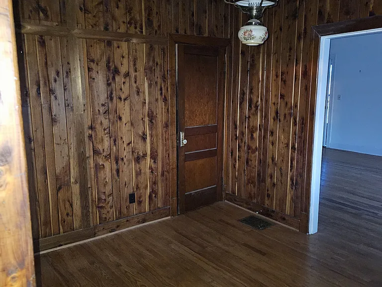 Interior paneled room off of Sunroom
