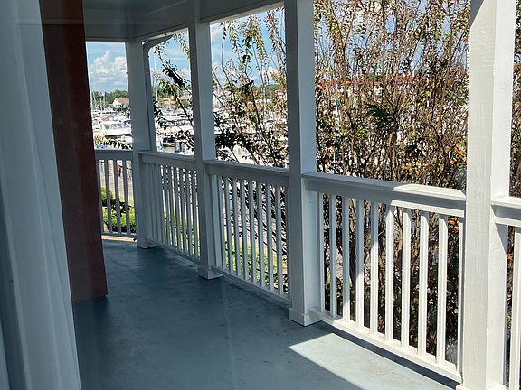 wrap around porch (larger open porch behind picture)