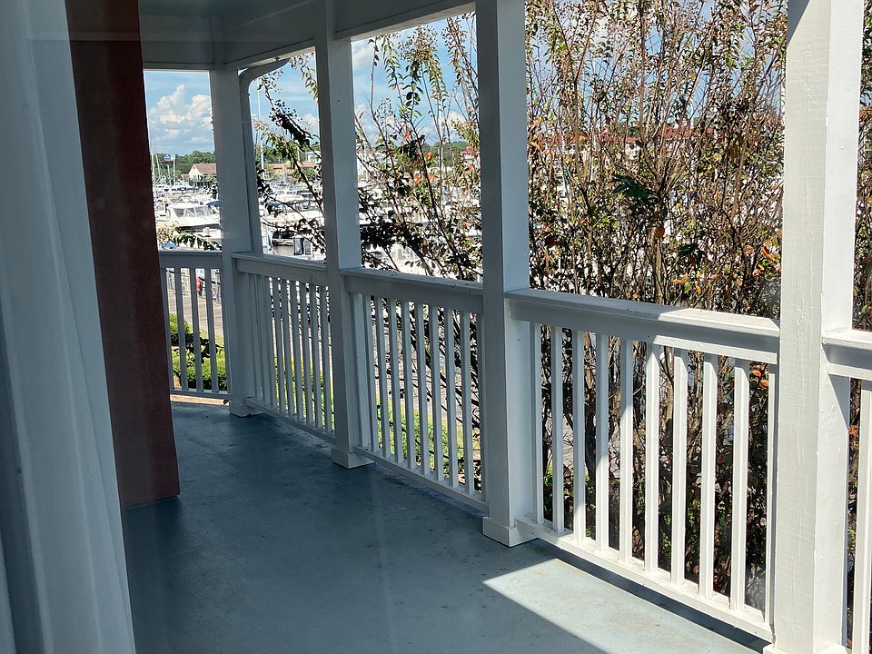 wrap around porch (larger open porch behind picture)