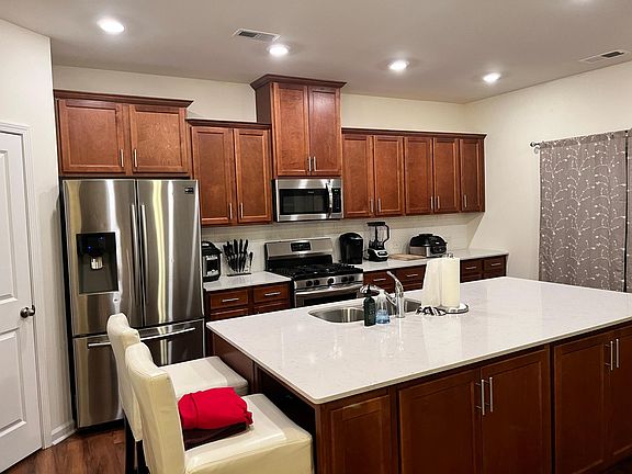 Kitchen with Dishwasher, Refrigerator, Microwave