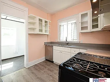 Kitchen with view of dining porch