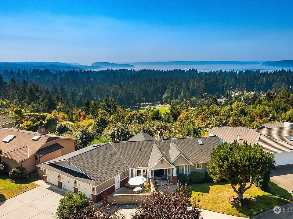 Stunning Wescliffe home with unbelievable views of the sound + Olympic mountains (protected by the HOA).>