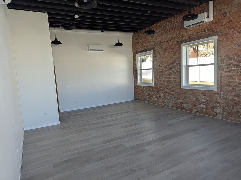 Exposed brick walls and north-facing windows