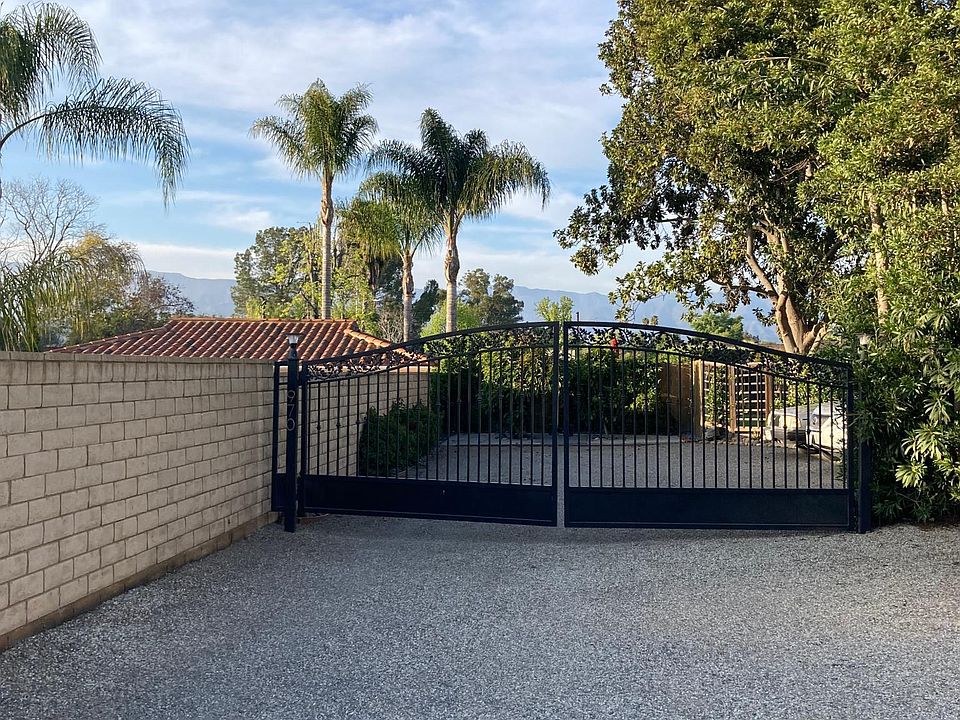 Entrance gate at end of private gravel road.