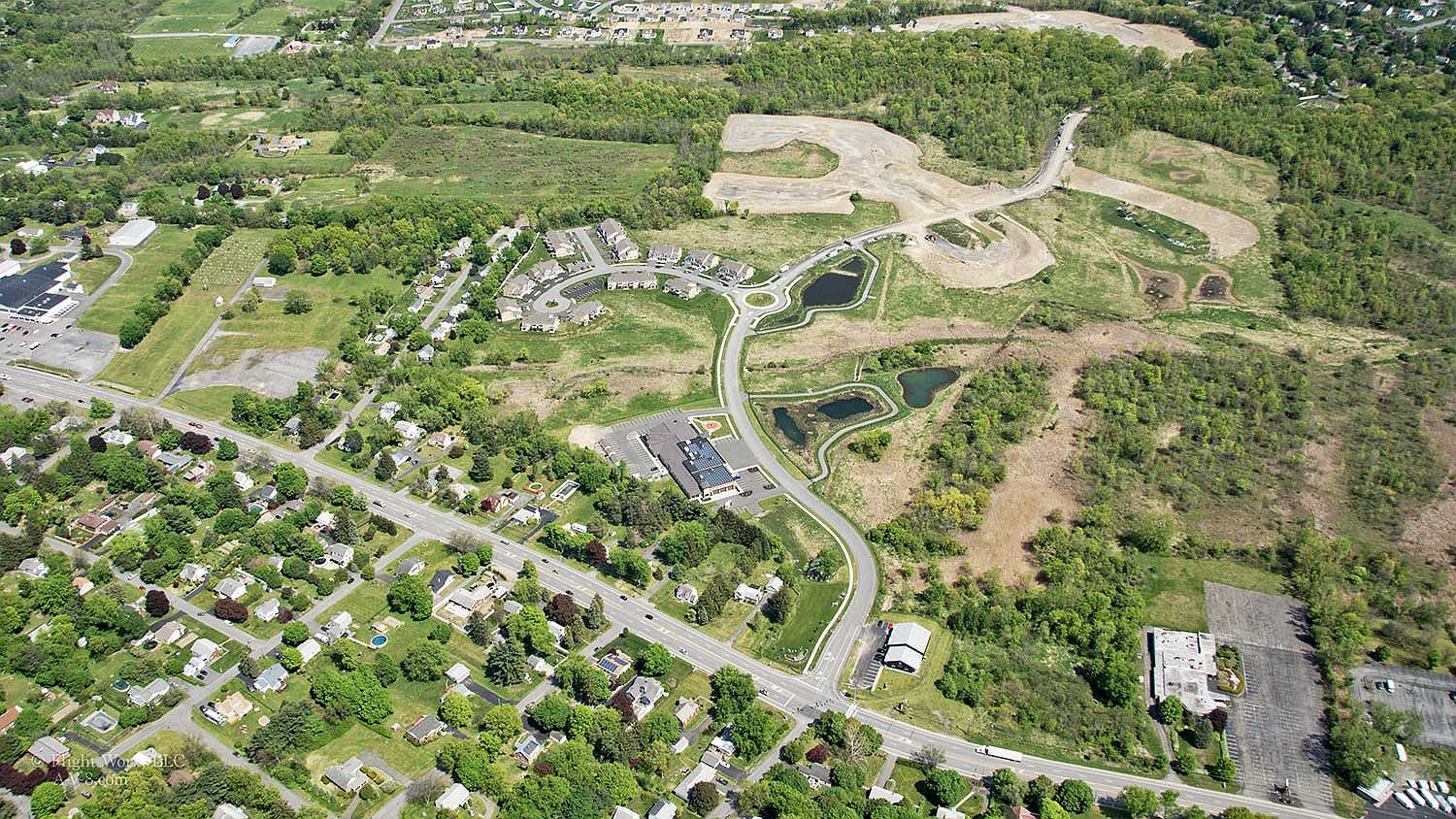 Canterbury Crossing Condominiums Phases 4 & 5 by Amedore Homes in