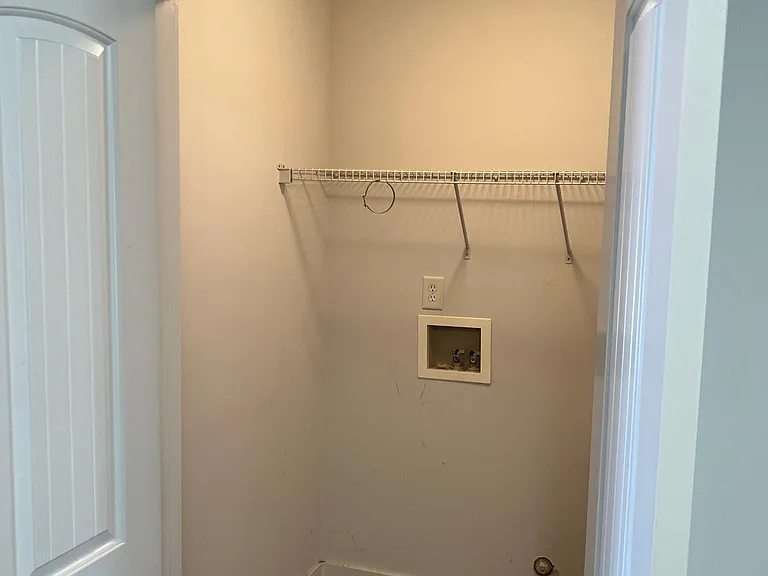 Laundry room off kitchen.