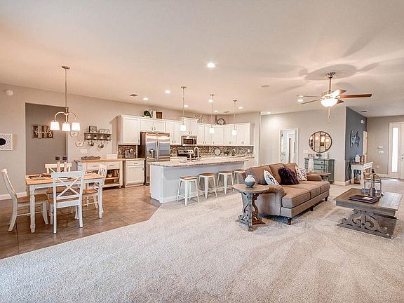 Enjoy an open and inviting living area - Waylyn home plan by Highland Homes