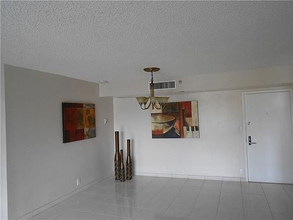 5th image of 3530 Mystic Pointe Dr APT 402