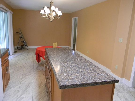 Newly tiled floors and spacious island