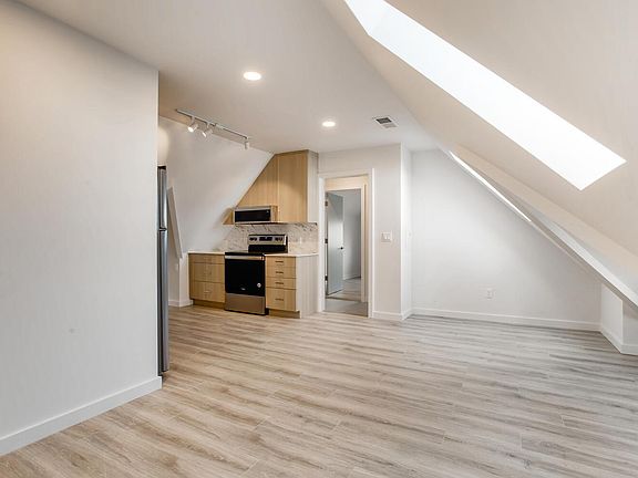 Living Room with 2 large skylights