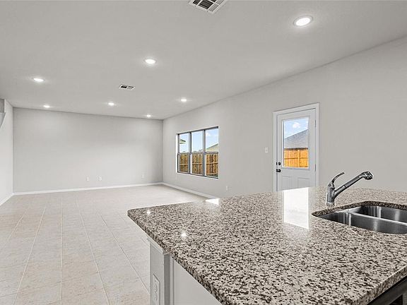 A look of the family room from the kitchen.