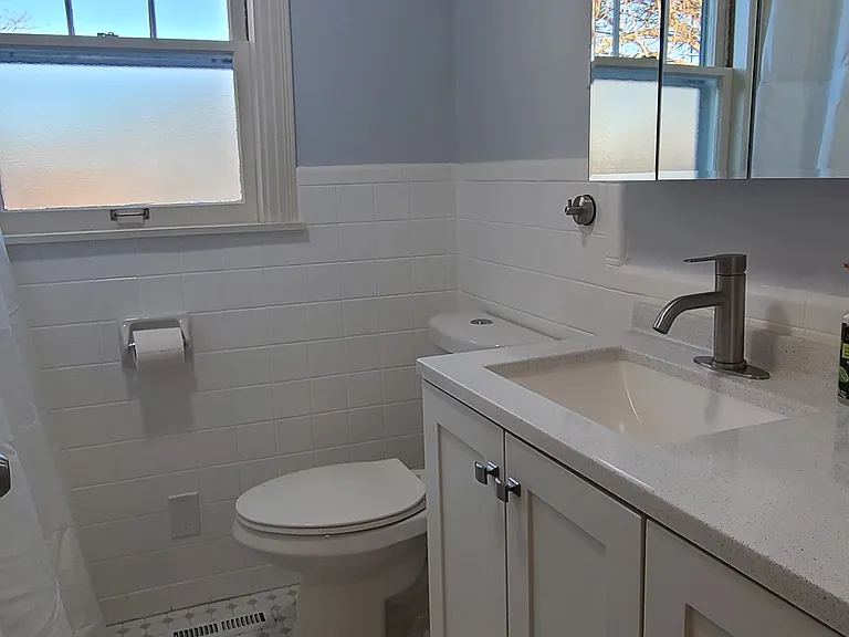 Bathroom 1: This full bathroom is on the upper floor with Bedroom 1 and Bedroom 2.