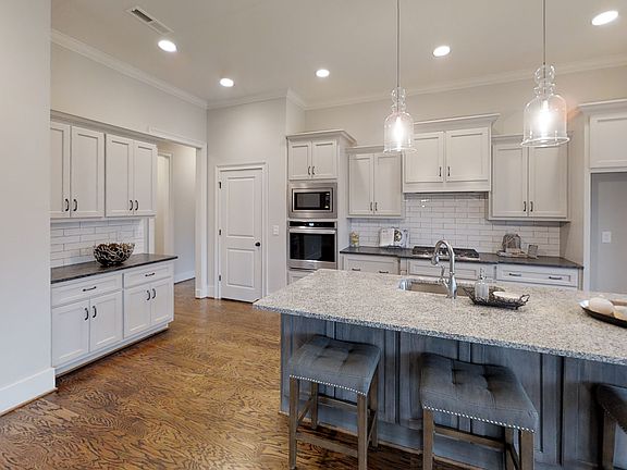 Previously built home based on this plan. Photos not of current home. Upgrades may be pictured.