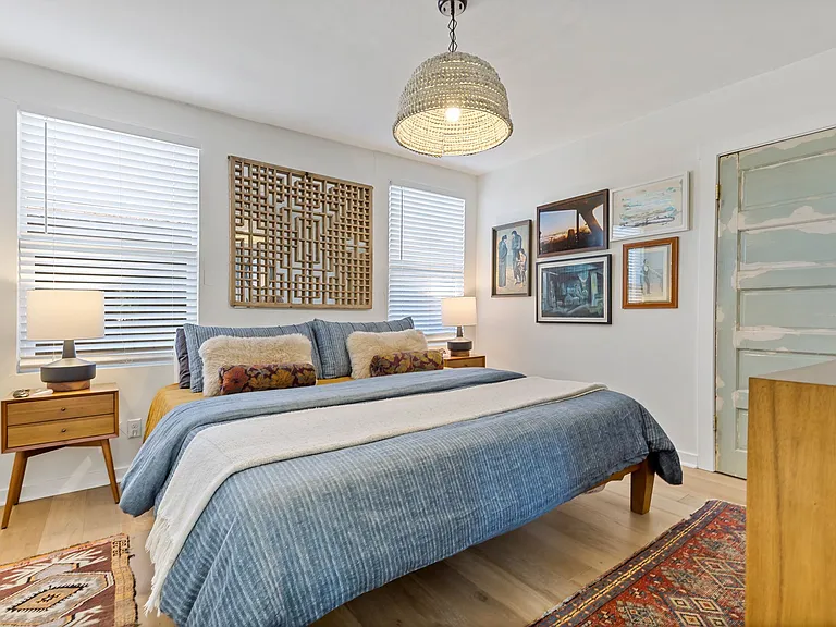 Primary Bedroom with architecturally salvaged closet door