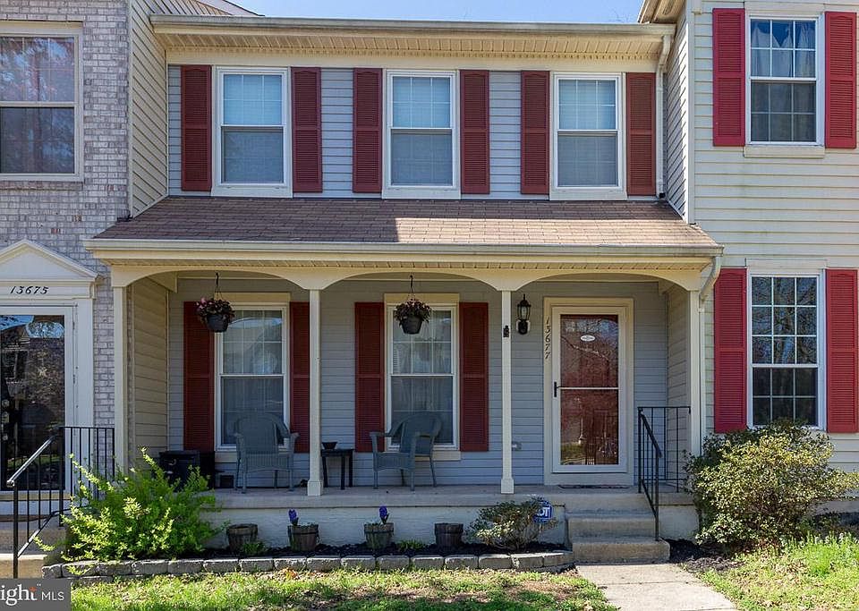 Charming 3 level home with a porch for relaxing!