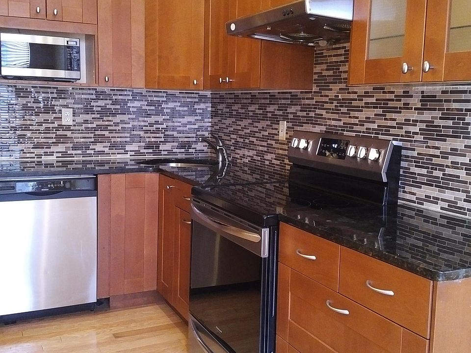 Kitchen with New Stainless Steel Stove